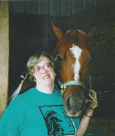 Photo of Karen and her therapy horse, Frosty