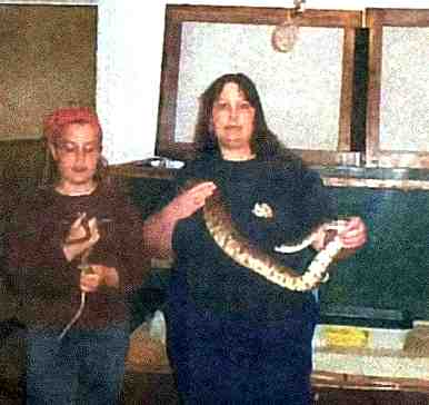 Carol, daughter, and boa snake